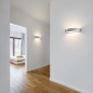 Preview: HELESTRA YONA 28/1427.25 LED Wandleuchte 15 W 1310 lm 3000 K Warmweiß CRI 90–100 Aluminium poliert Mattweiß