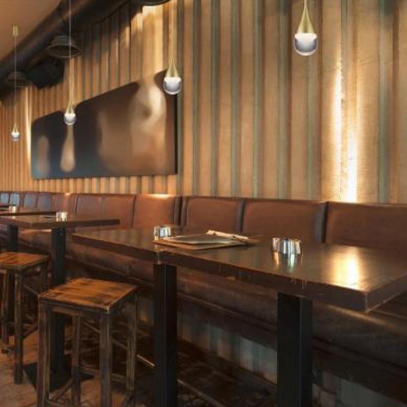 Tropfenförmige matt goldene Helestra LED Pendelleuchte DEEP