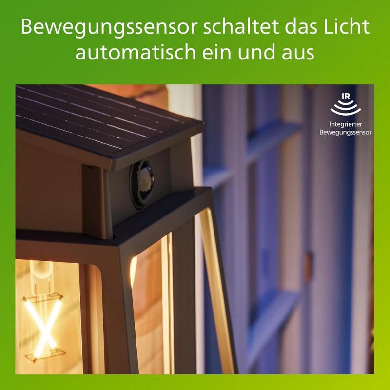 Philips Solar Wandleuchte Lysin in Schwarz mit Bewegungssensor UltraEfficient in klassischer Laternenform - 2700K warmweißes Licht, austauschbare Solarlampe